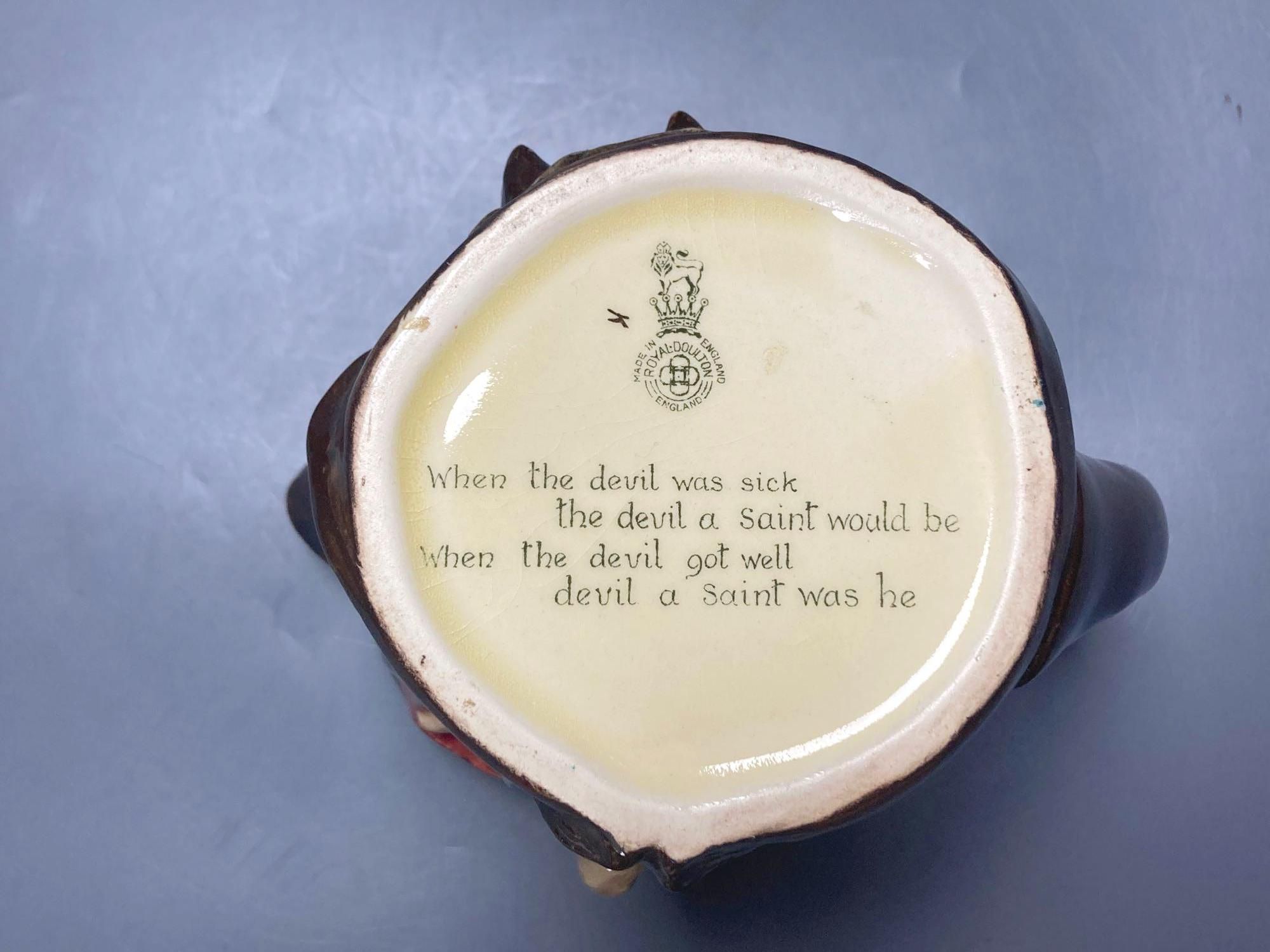 A Royal Doulton Mephistopheles large character jug, 15cm high